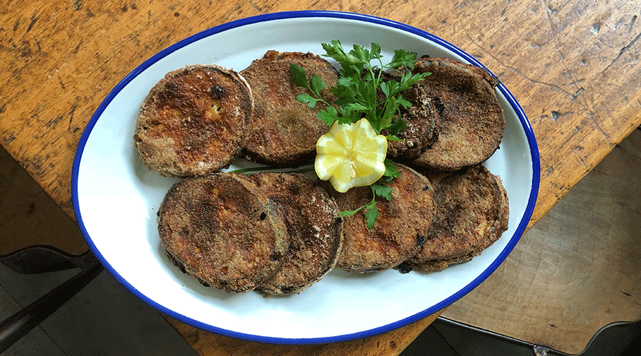 Berenjenas rebozadas al horno con tomate y queso