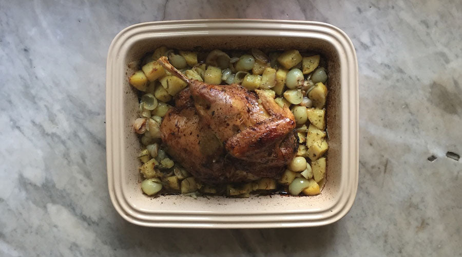 Capón asado con mantequilla de hierbas