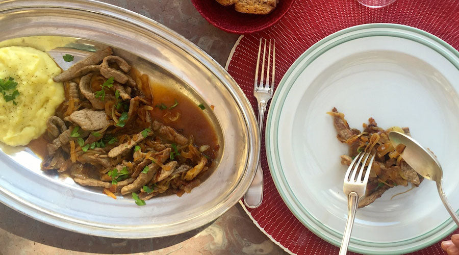 Tiras de carne  Encebolladas